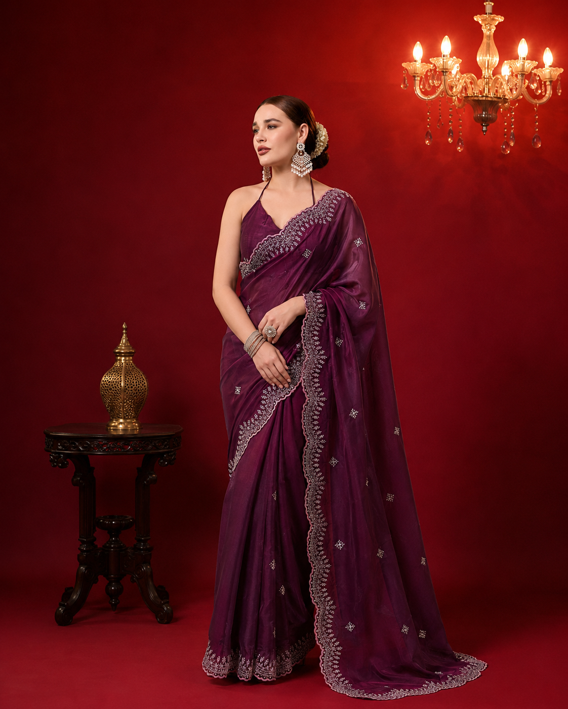 Fancy jimmy choo party wear saree with embroidery work.