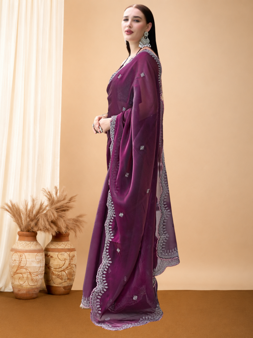 Fancy jimmy choo party wear saree with embroidery work.