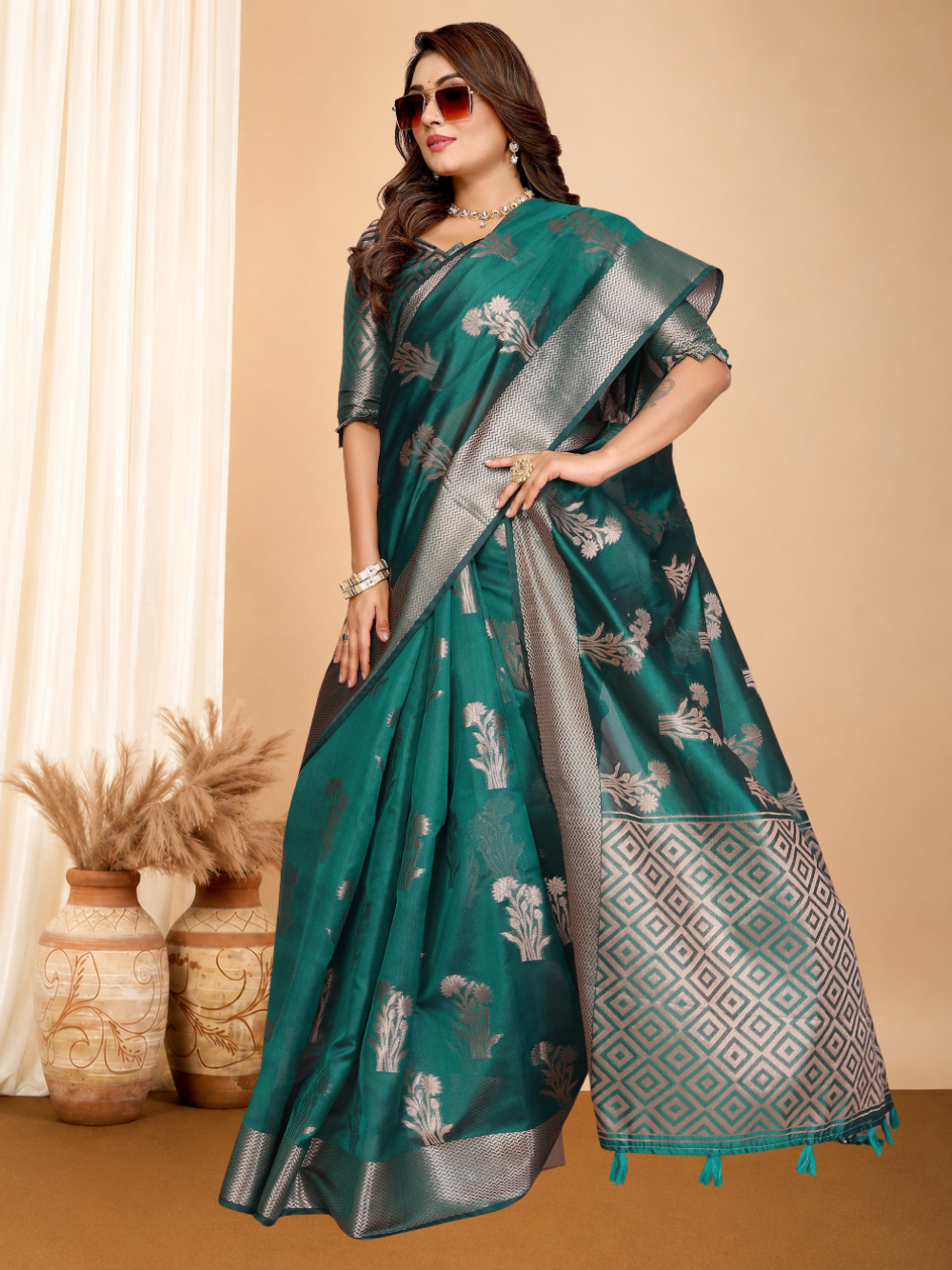 Fancy organza silk banarasi saree with zari weaving work.