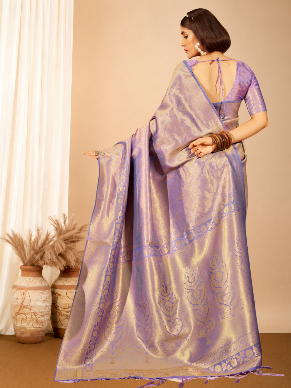Soft silk saree with zari weaving work.