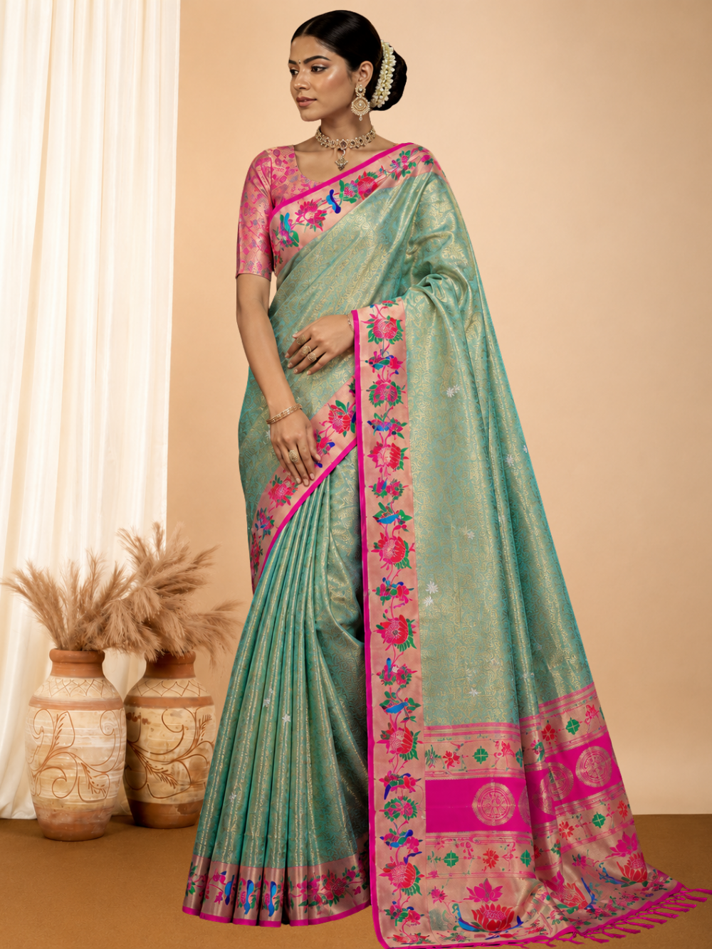 Soft tissue paithani silk saree with zari weaving work.
