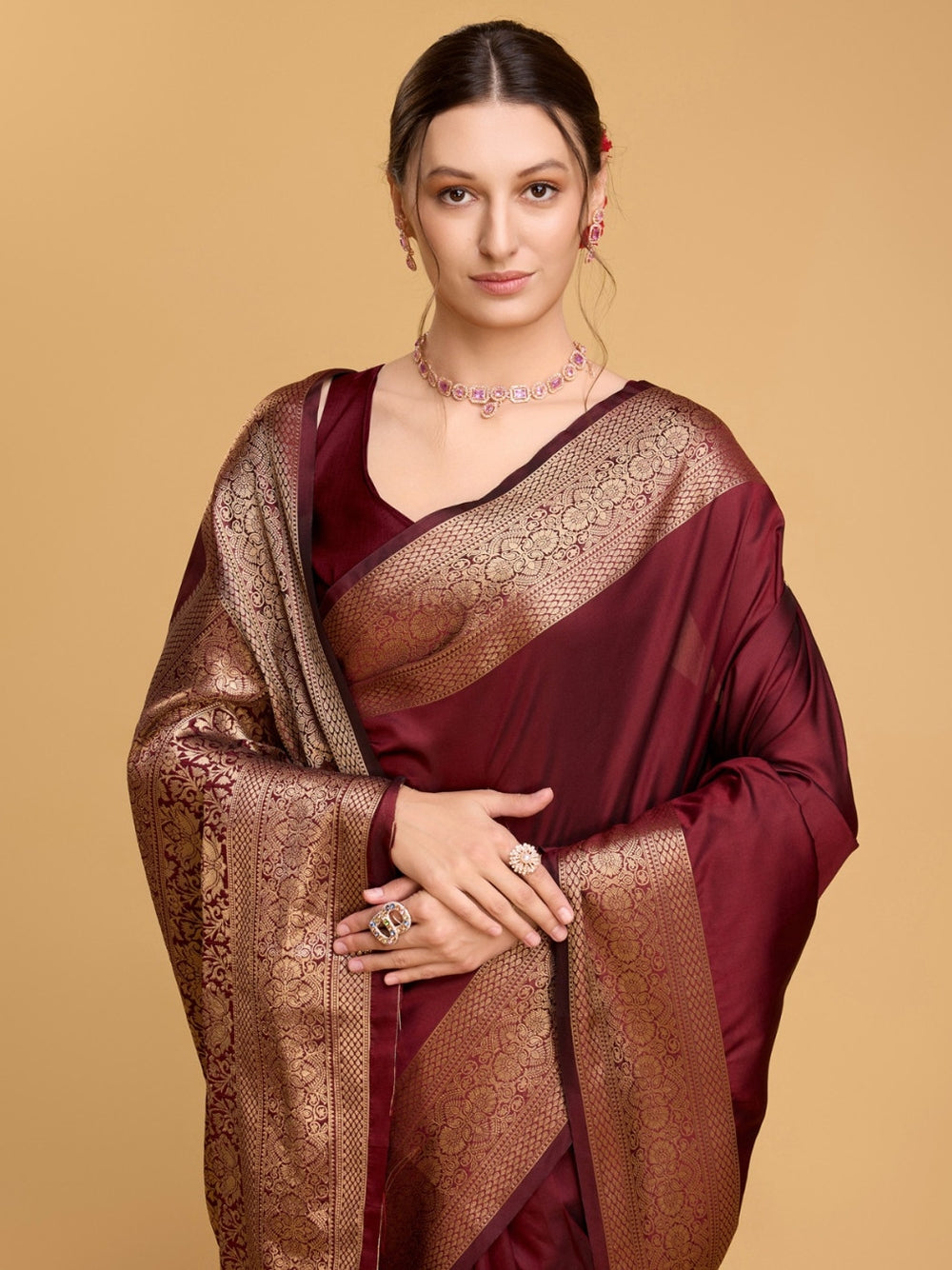 Soft kanchipuram silk saree with golden zari weaving work.