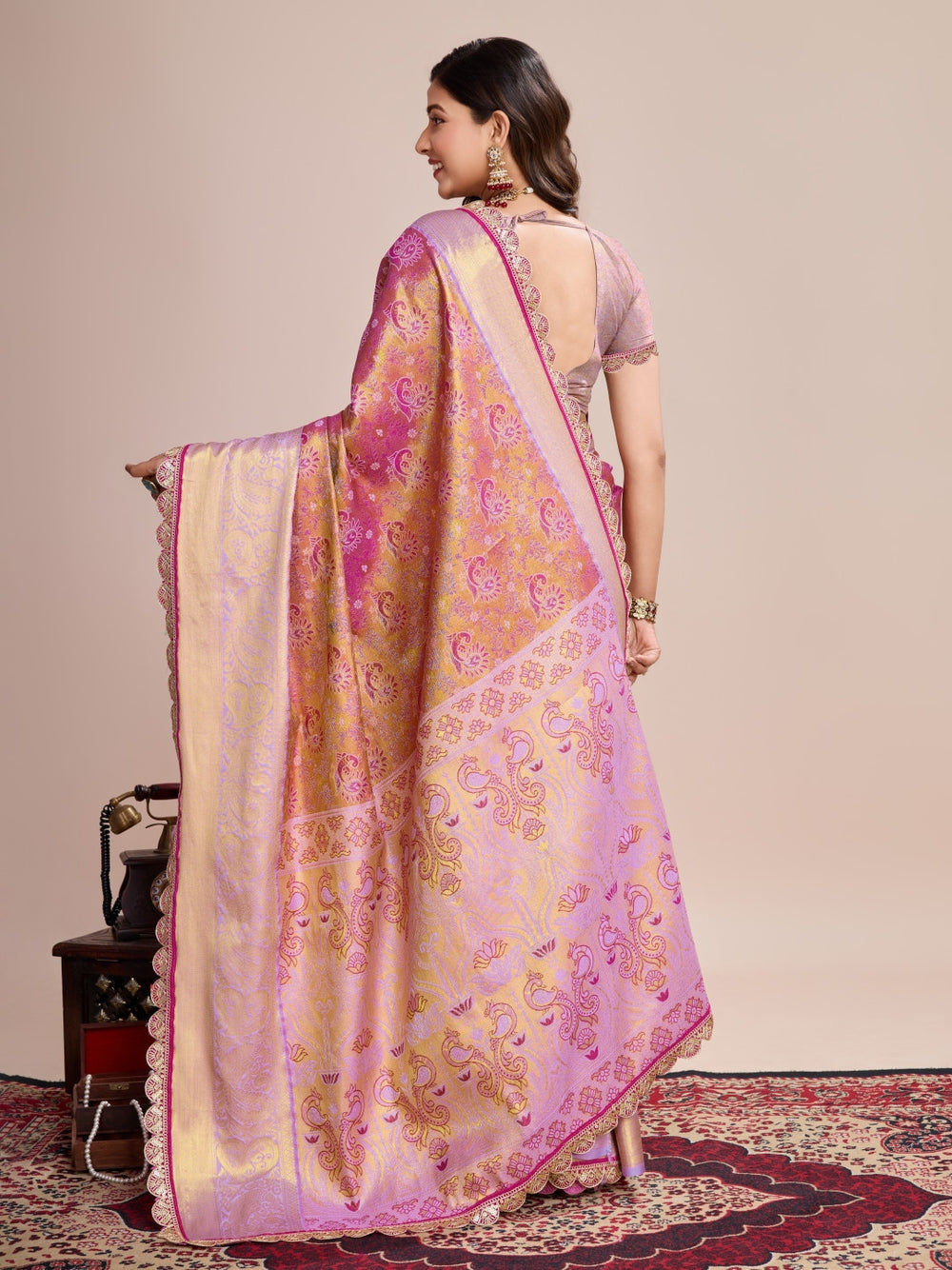 Kanjivaram silk saree with zari weaving work.