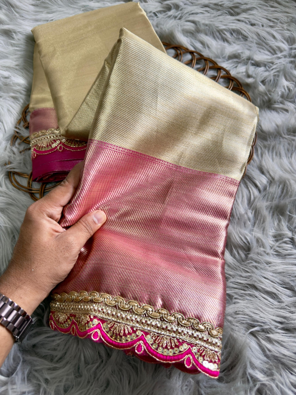 Gold soft tissue silk saree with chex design rich pallu and brocade blouse.