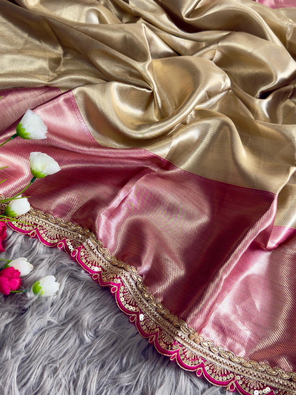 Gold soft tissue silk saree with chex design rich pallu and brocade blouse.