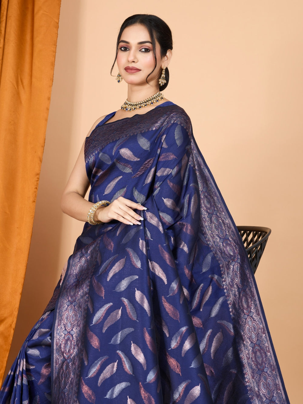 Traditional banarasi silk saree with zari weaving work.