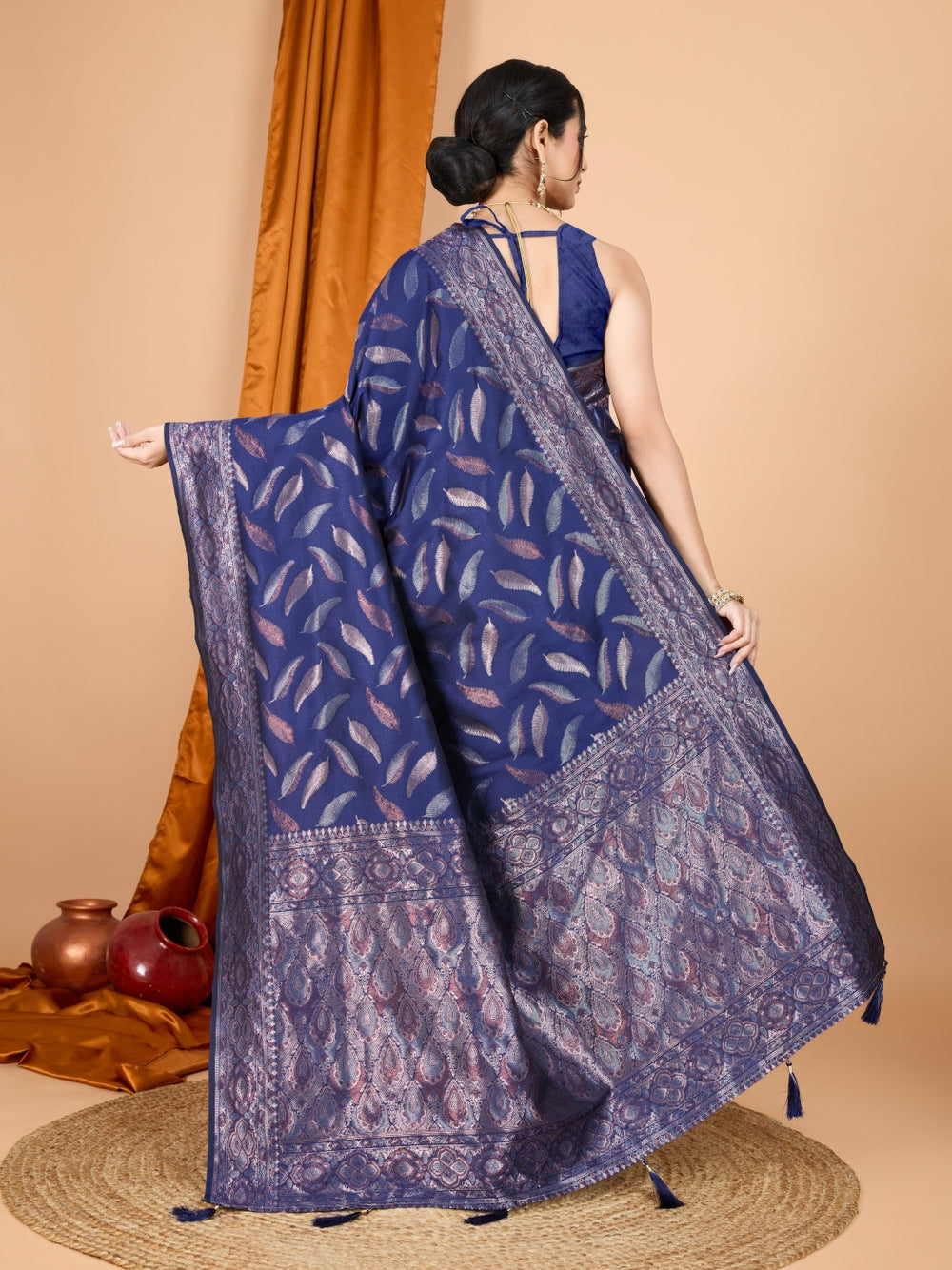 Traditional banarasi silk saree with zari weaving work.