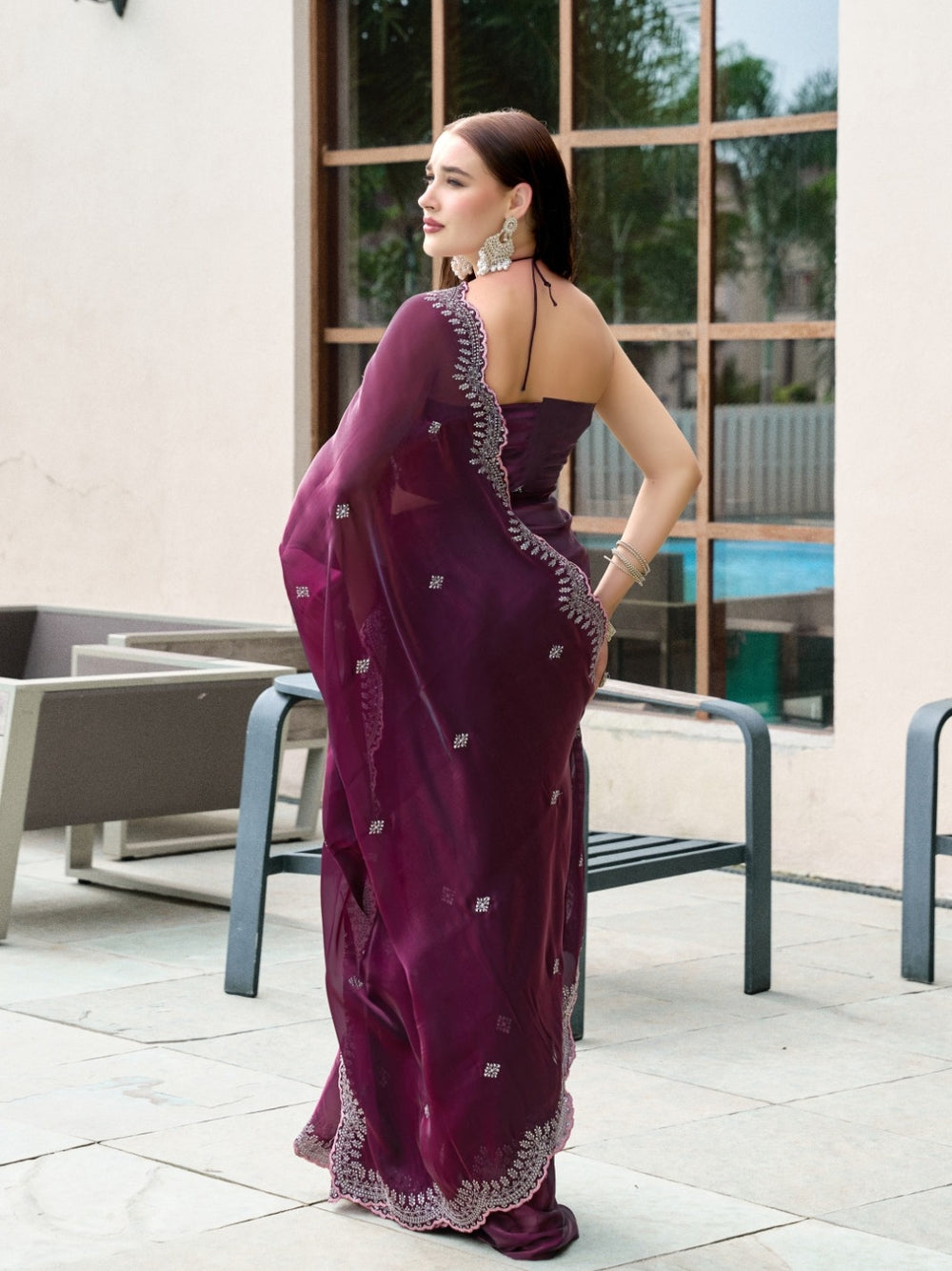 Fancy jimmy choo party wear saree with embroidery work.