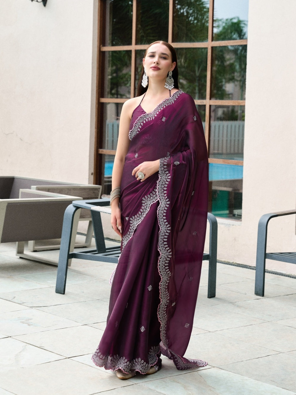 Fancy jimmy choo party wear saree with embroidery work.