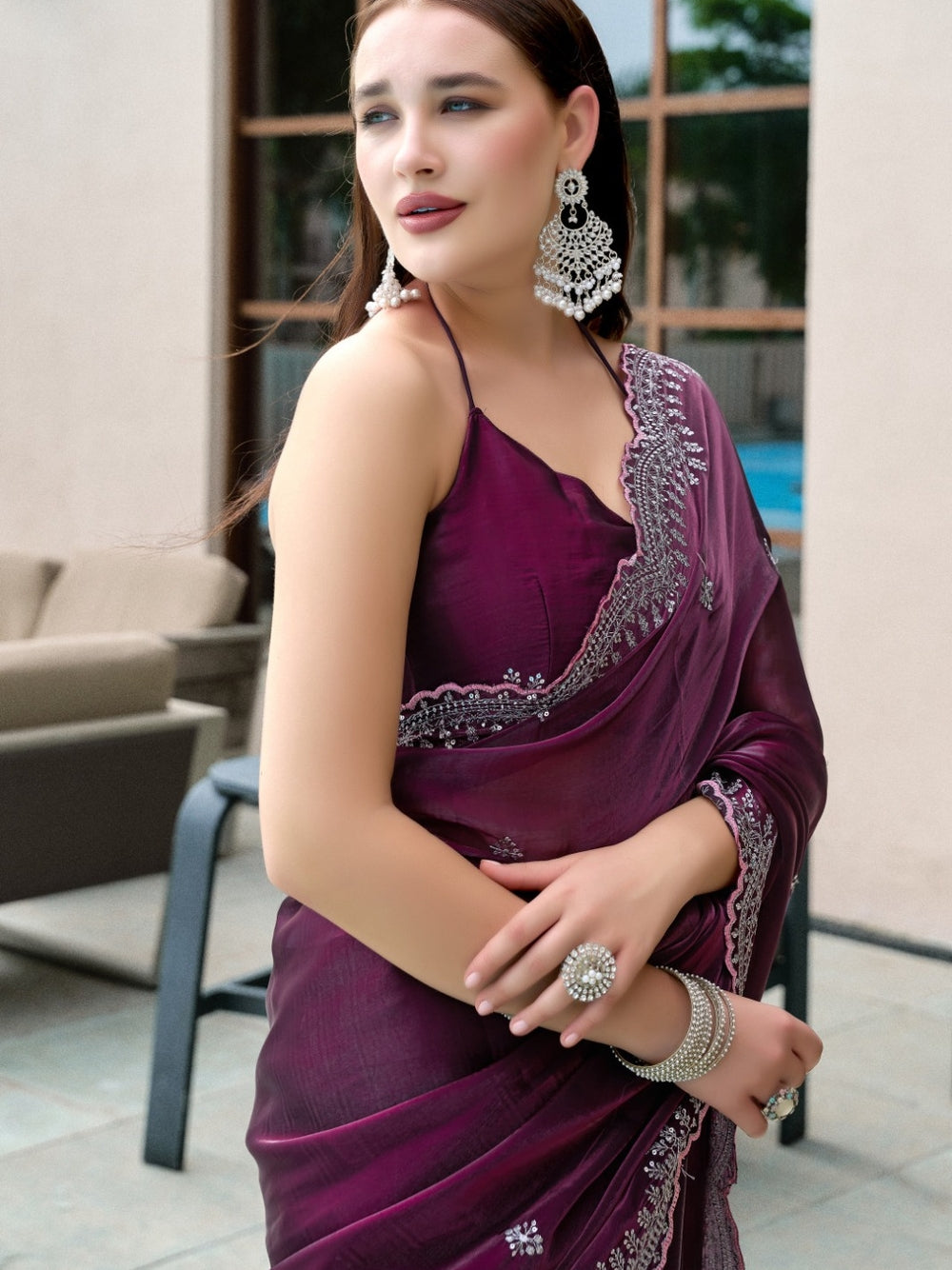 Fancy jimmy choo party wear saree with embroidery work.