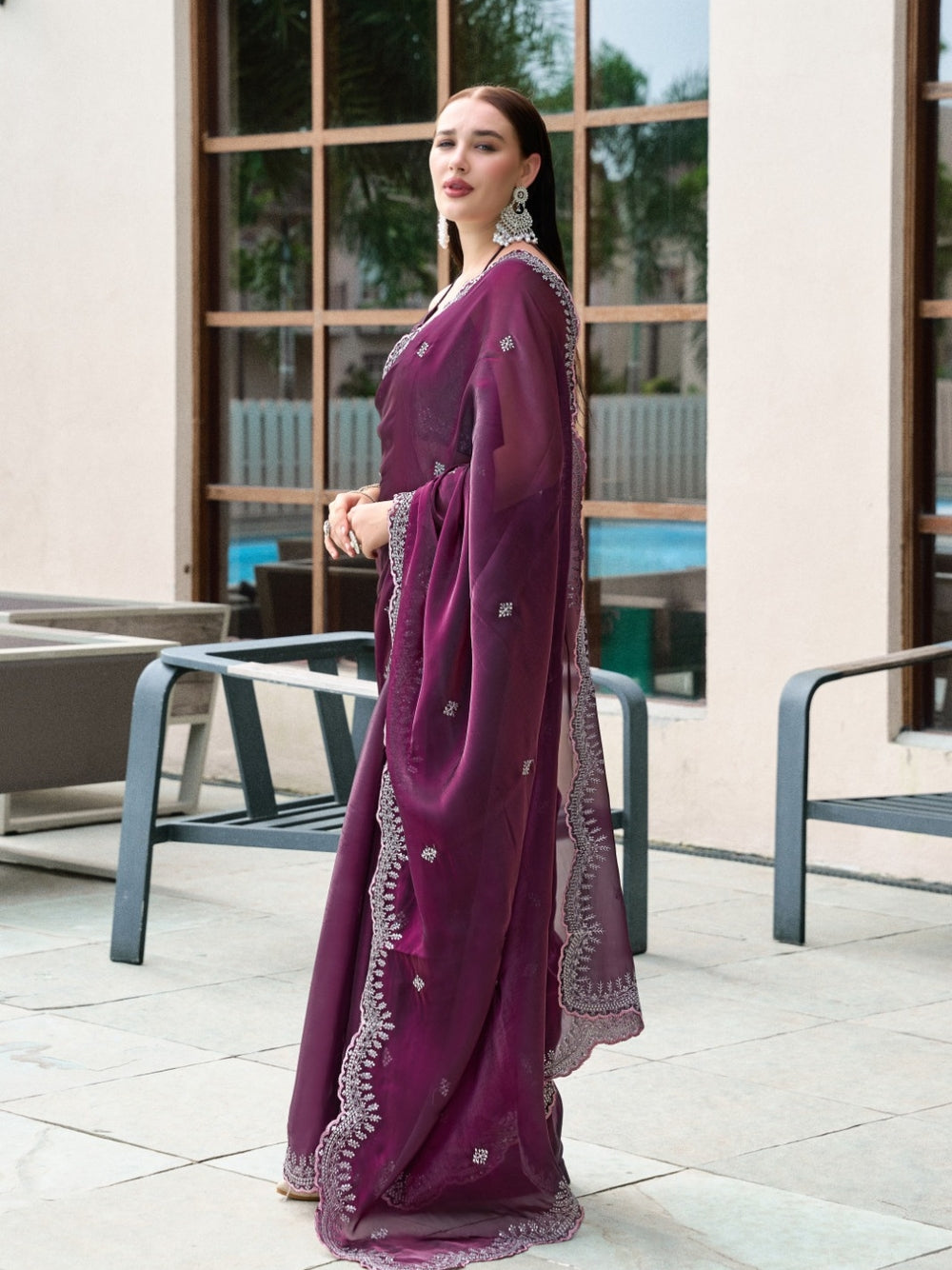 Fancy jimmy choo party wear saree with embroidery work.