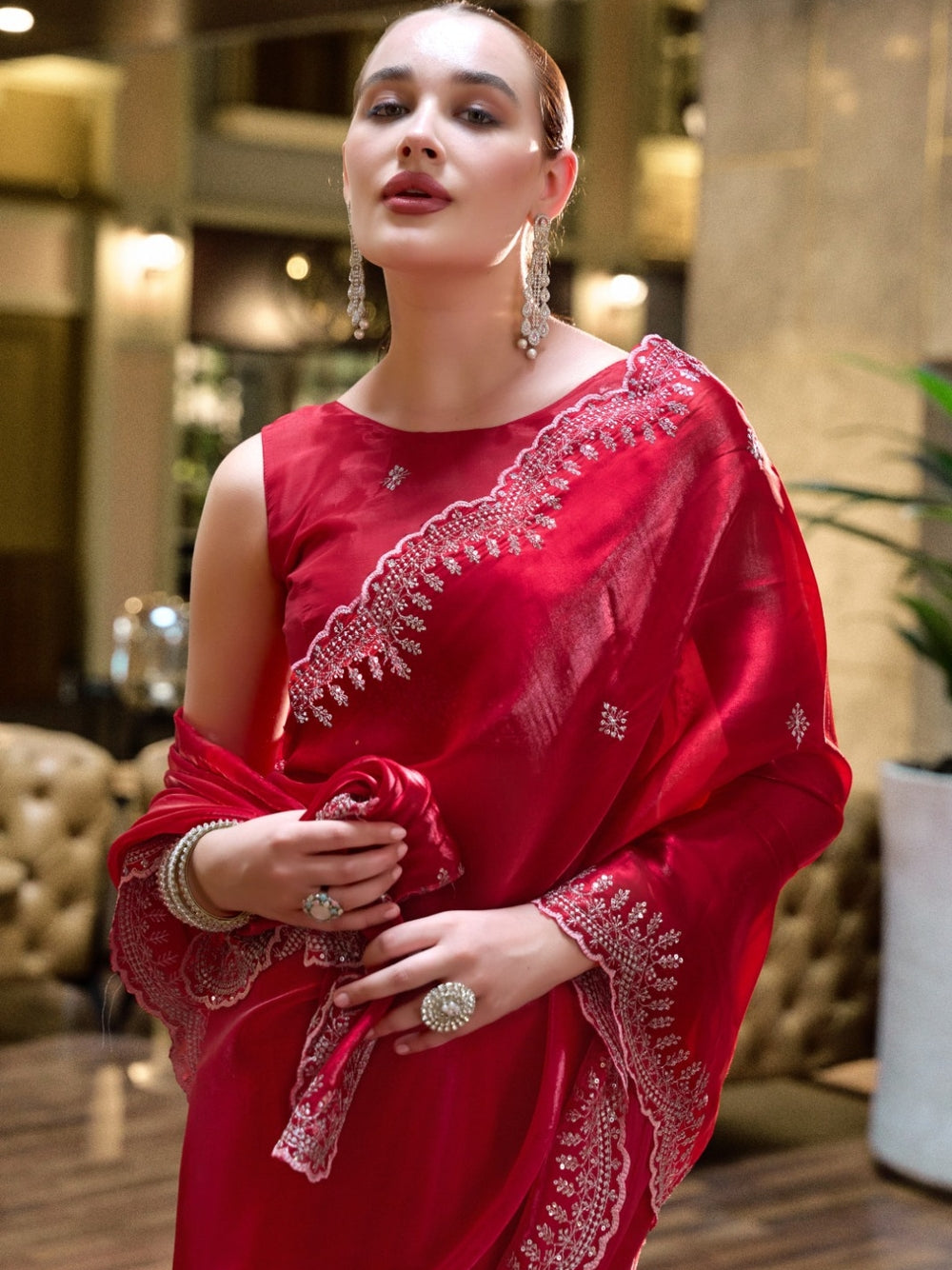 Fancy jimmy choo party wear saree with embroidery work.