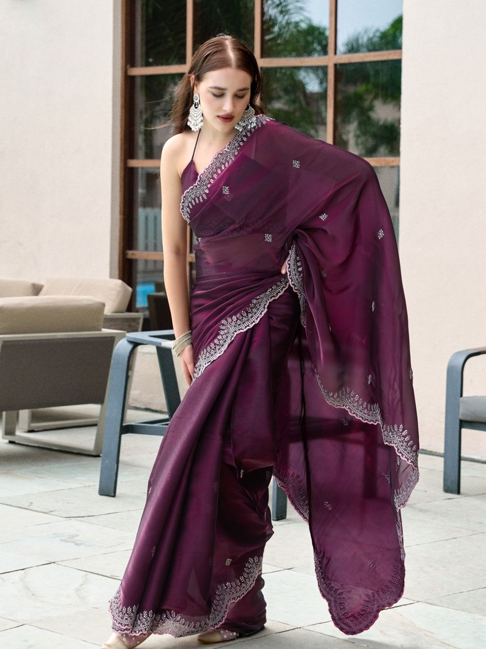 Fancy jimmy choo party wear saree with embroidery work.