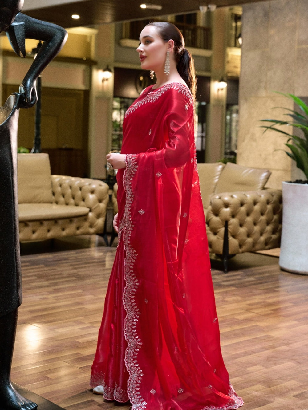 Fancy jimmy choo party wear saree with embroidery work.