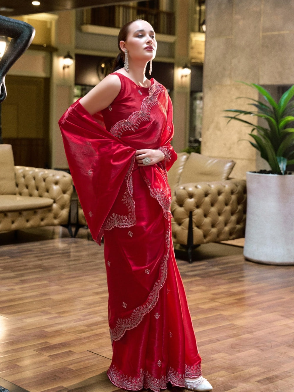 Fancy jimmy choo party wear saree with embroidery work.