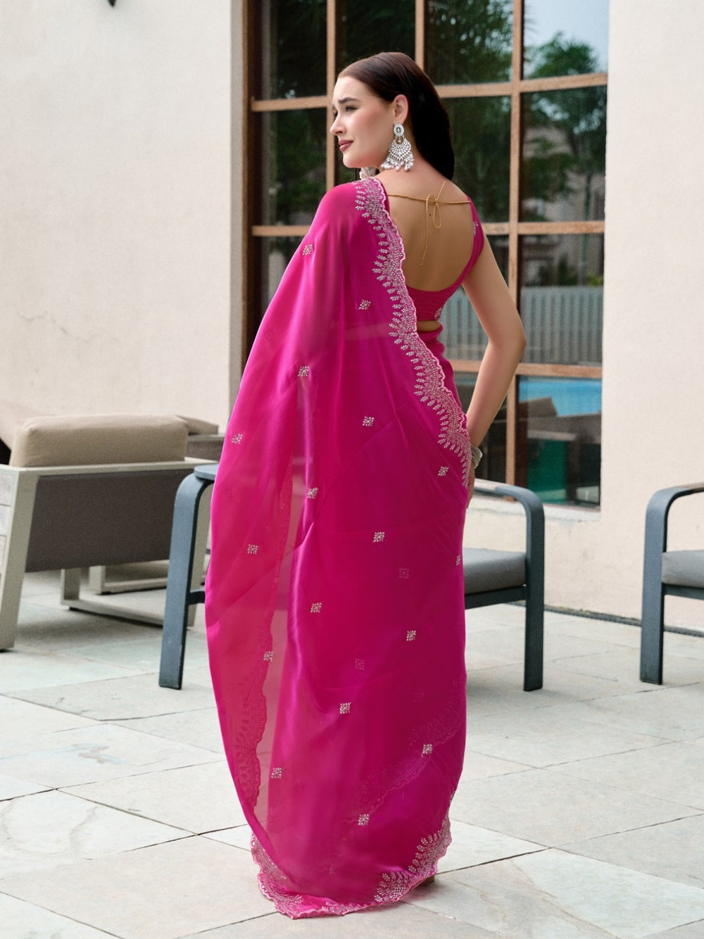 Fancy jimmy choo party wear saree with embroidery work.