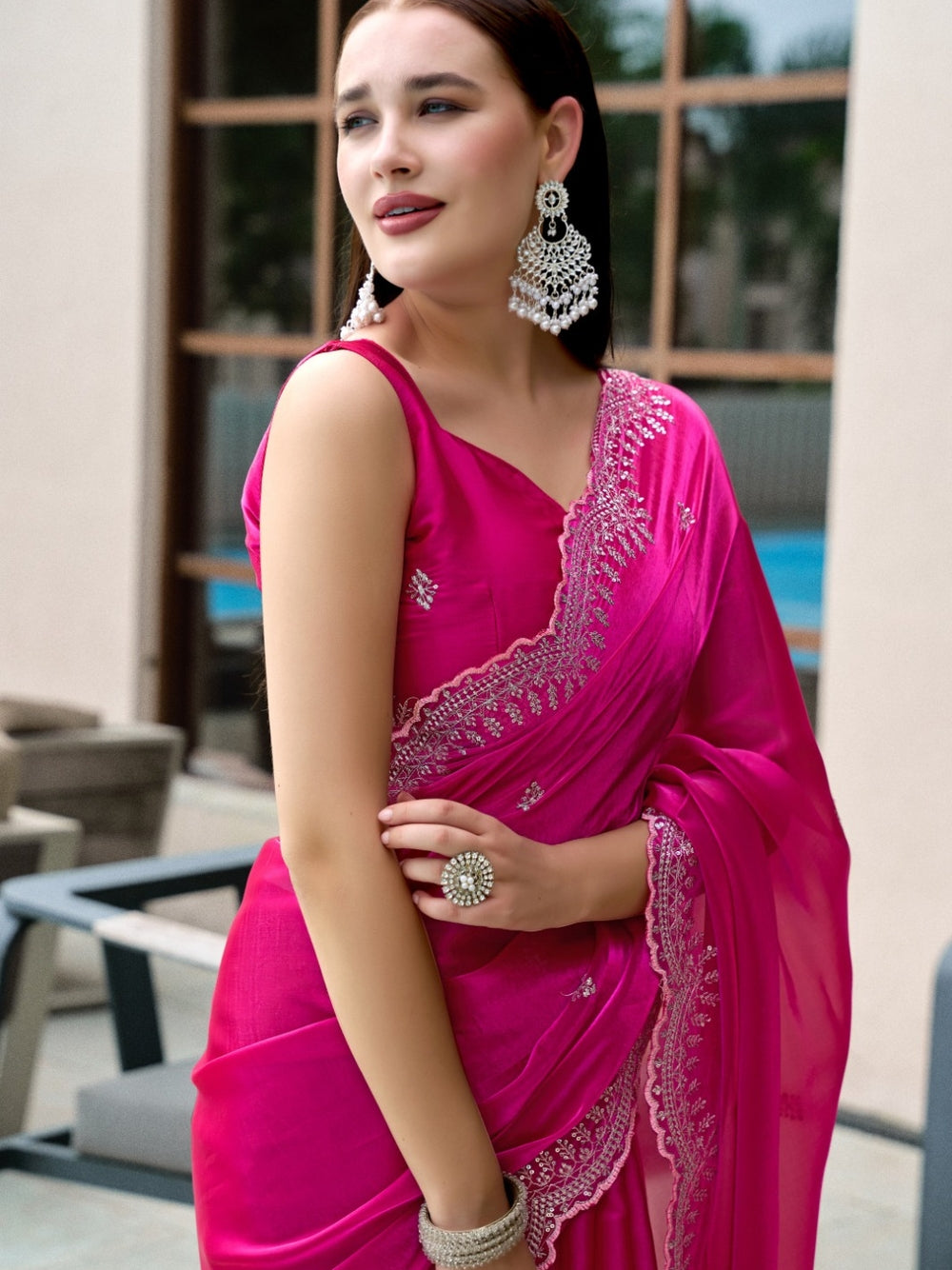 Fancy jimmy choo party wear saree with embroidery work.