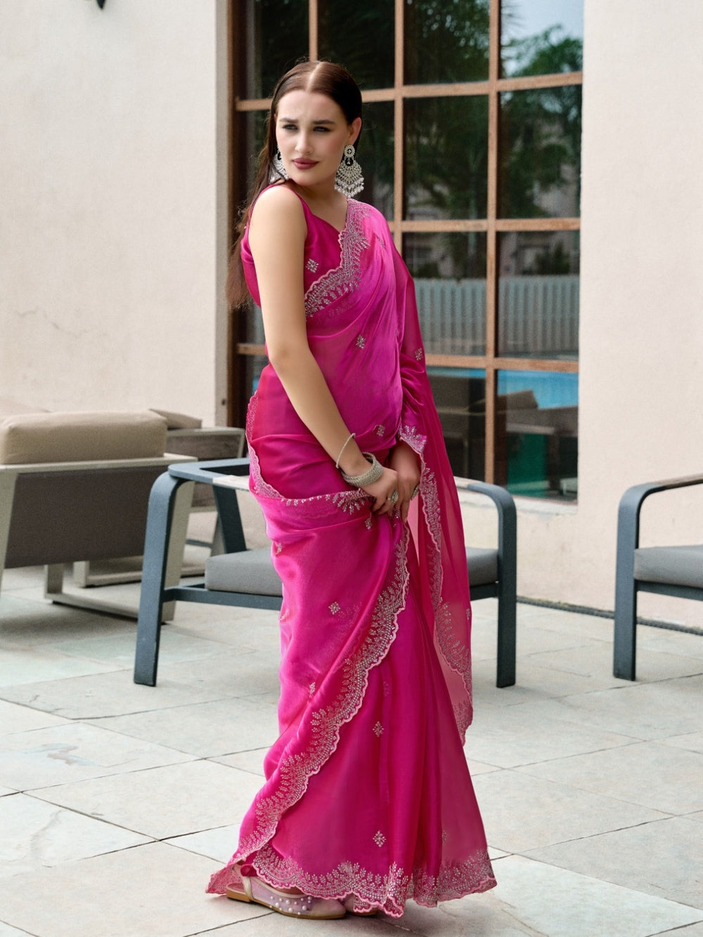 Fancy jimmy choo party wear saree with embroidery work.