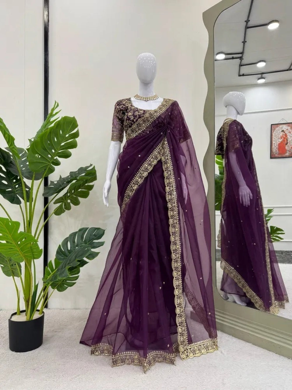 Wine colour organza silk saree with embroidery lace border with all over butta work