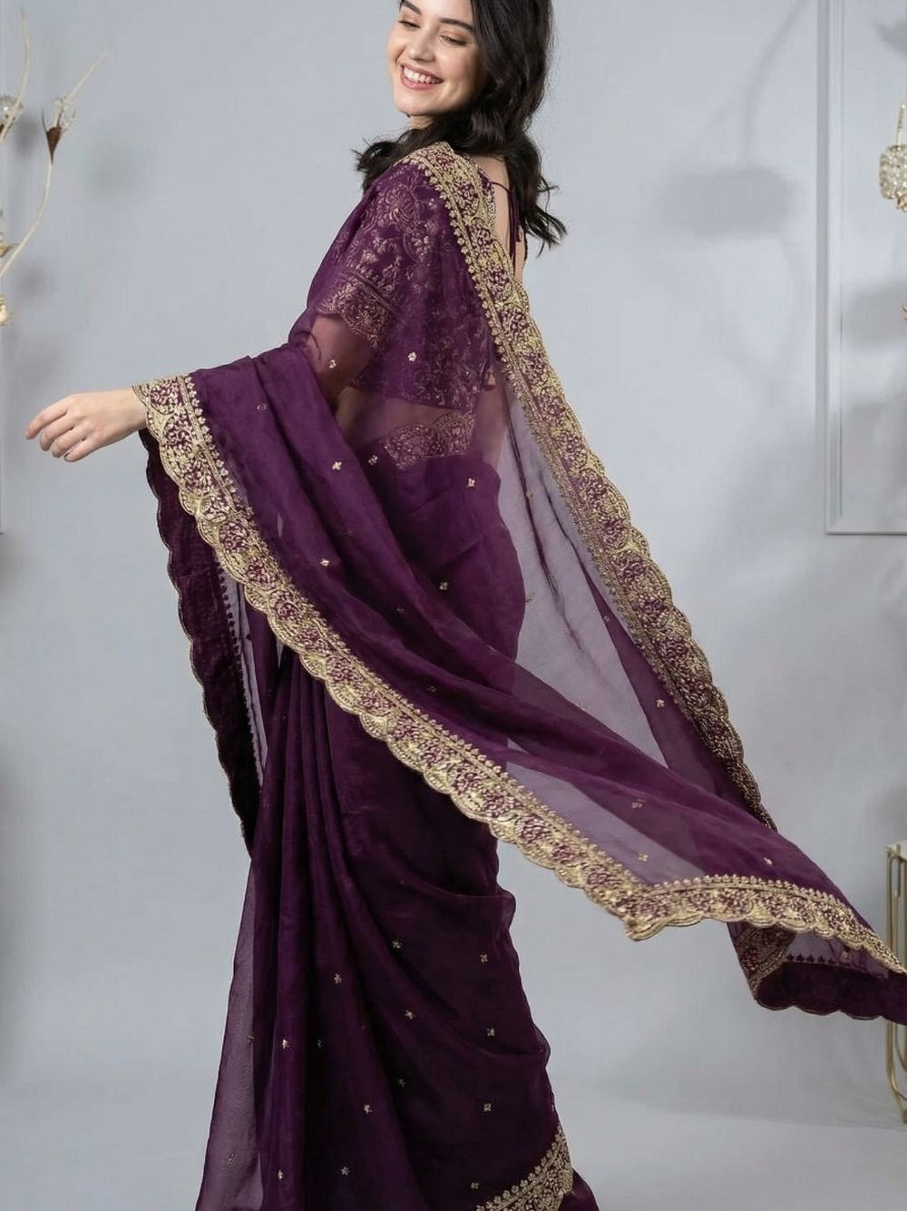 Wine colour organza silk saree with embroidery lace border with all over butta work