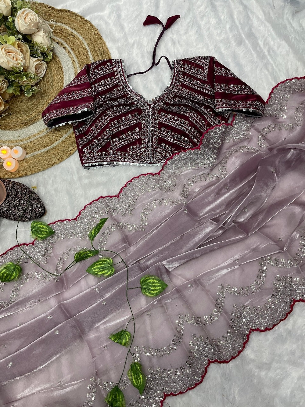 Pure jimmy choo satin saree with beautiful C-Pallu work and ready made blouse.