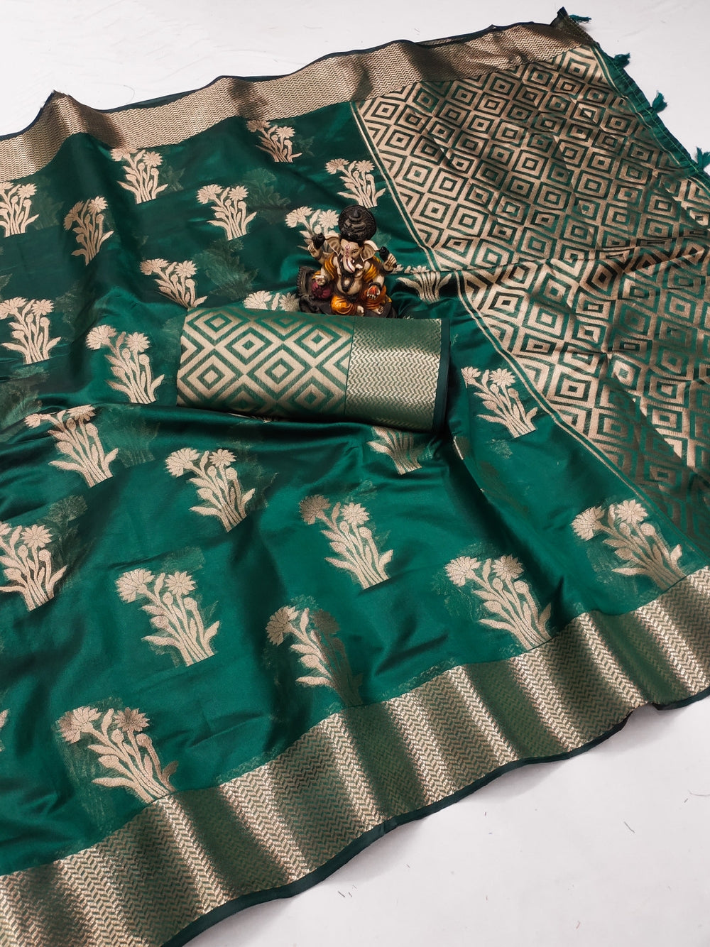 Fancy organza silk banarasi saree with zari weaving work.