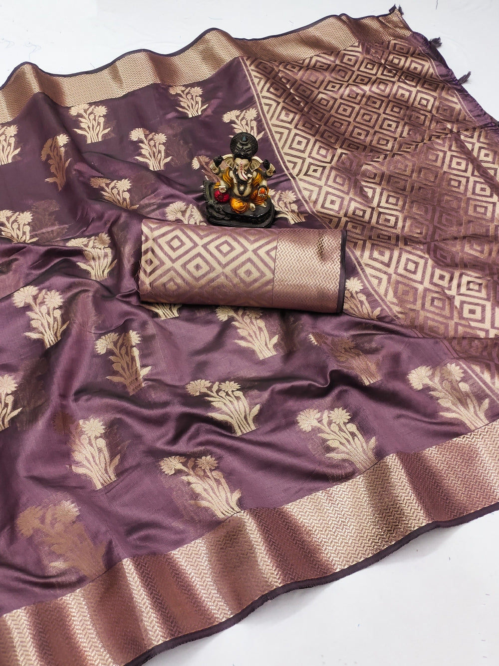 Fancy organza silk banarasi saree with zari weaving work.