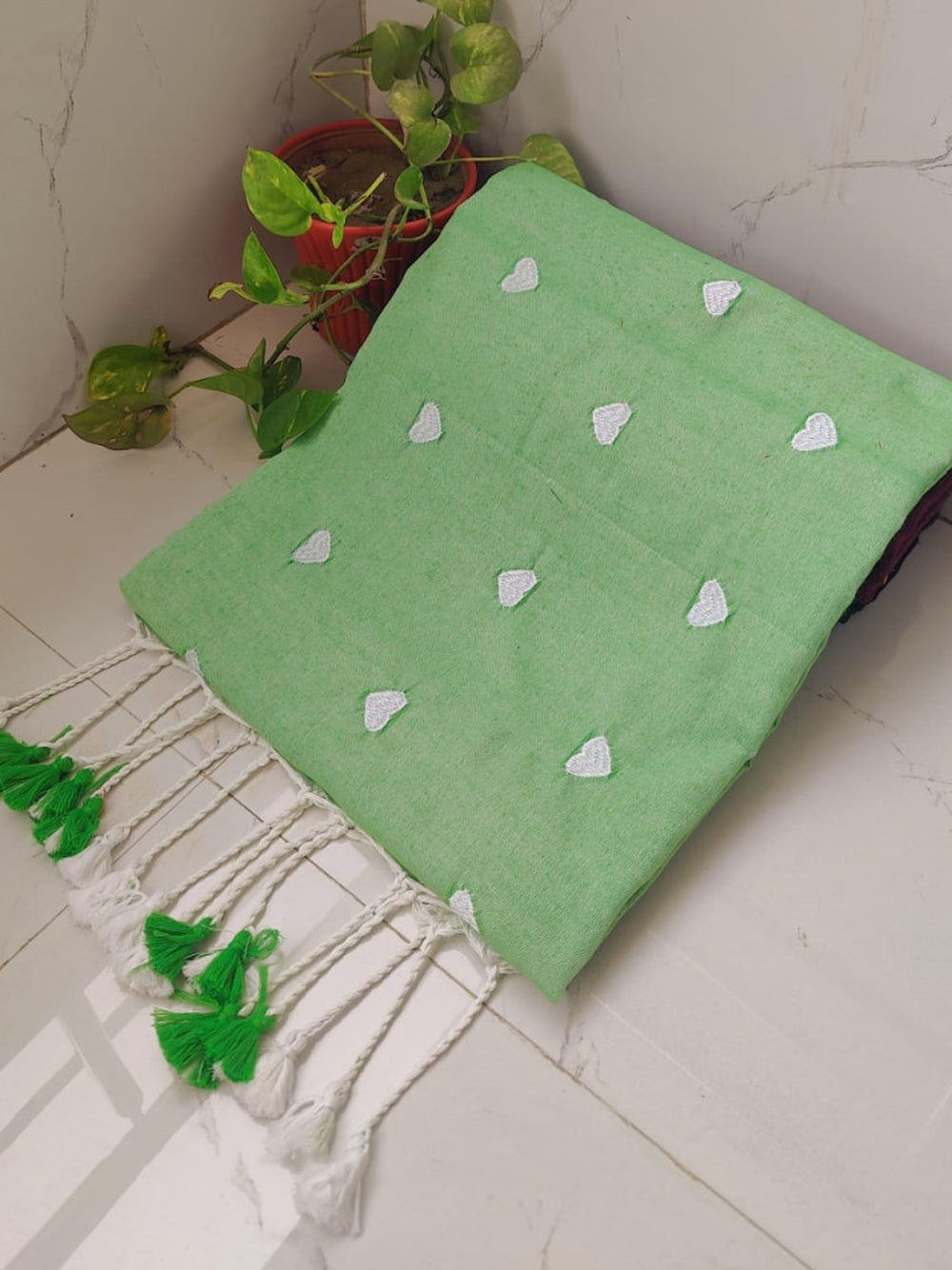 Khadi cotton saree with beautiful heart embroidery work.