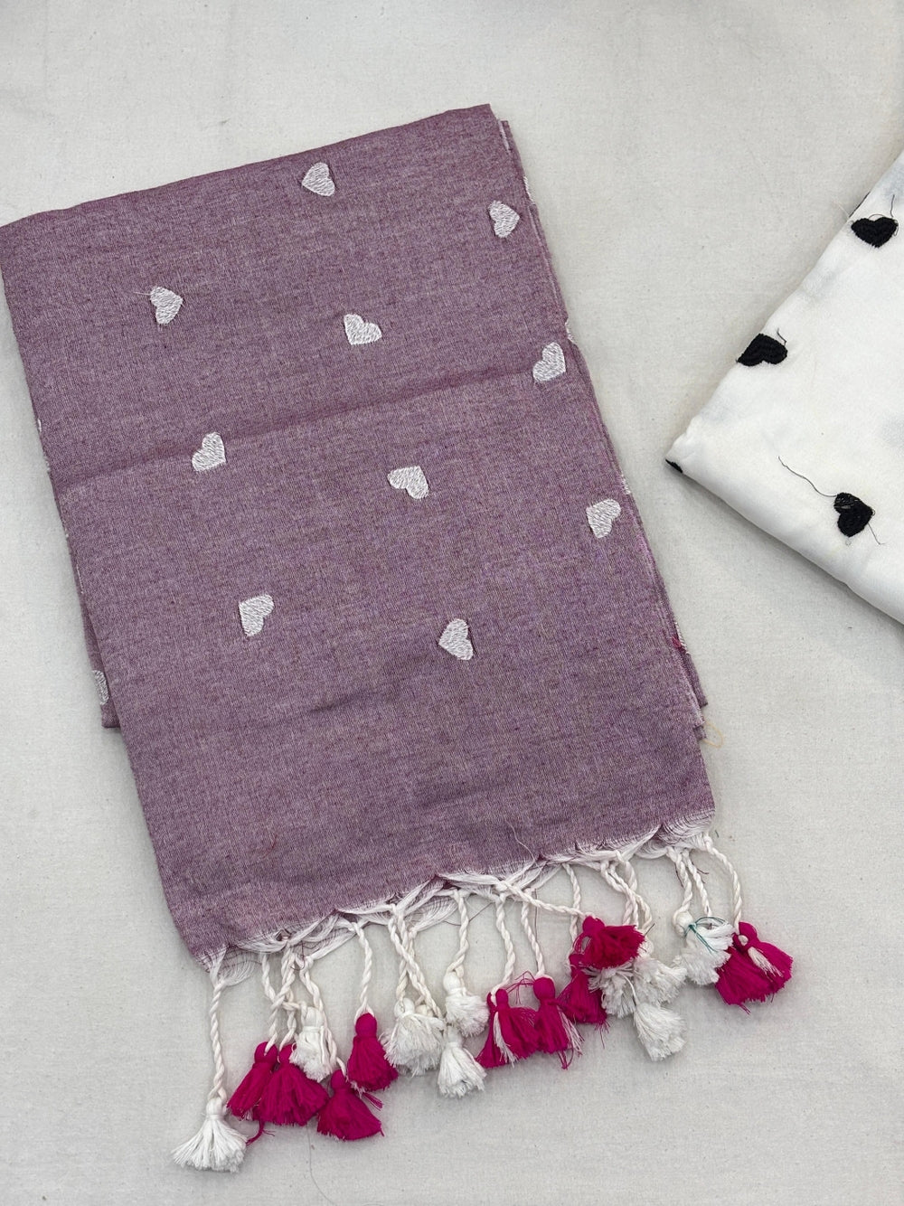Khadi cotton saree with beautiful heart embroidery work.