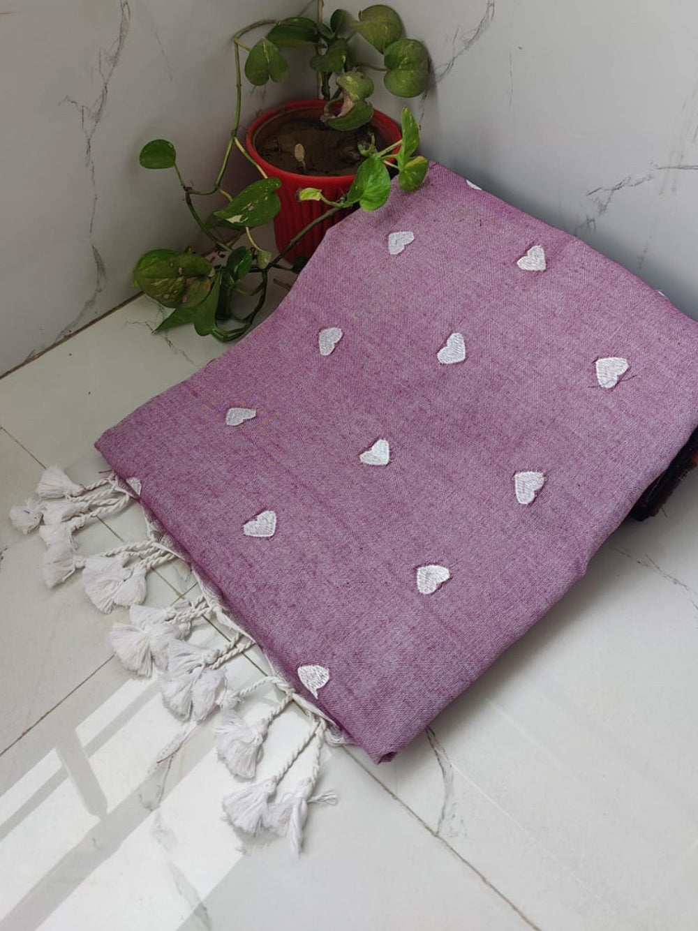 Khadi cotton saree with beautiful heart embroidery work.