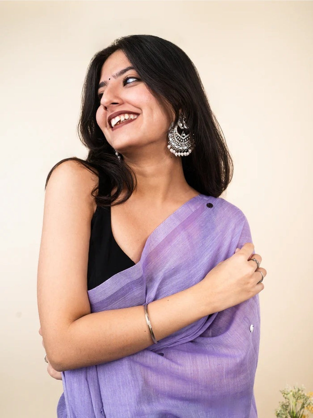 Plain khadi cotton saree with ginni and fancy tassel work.