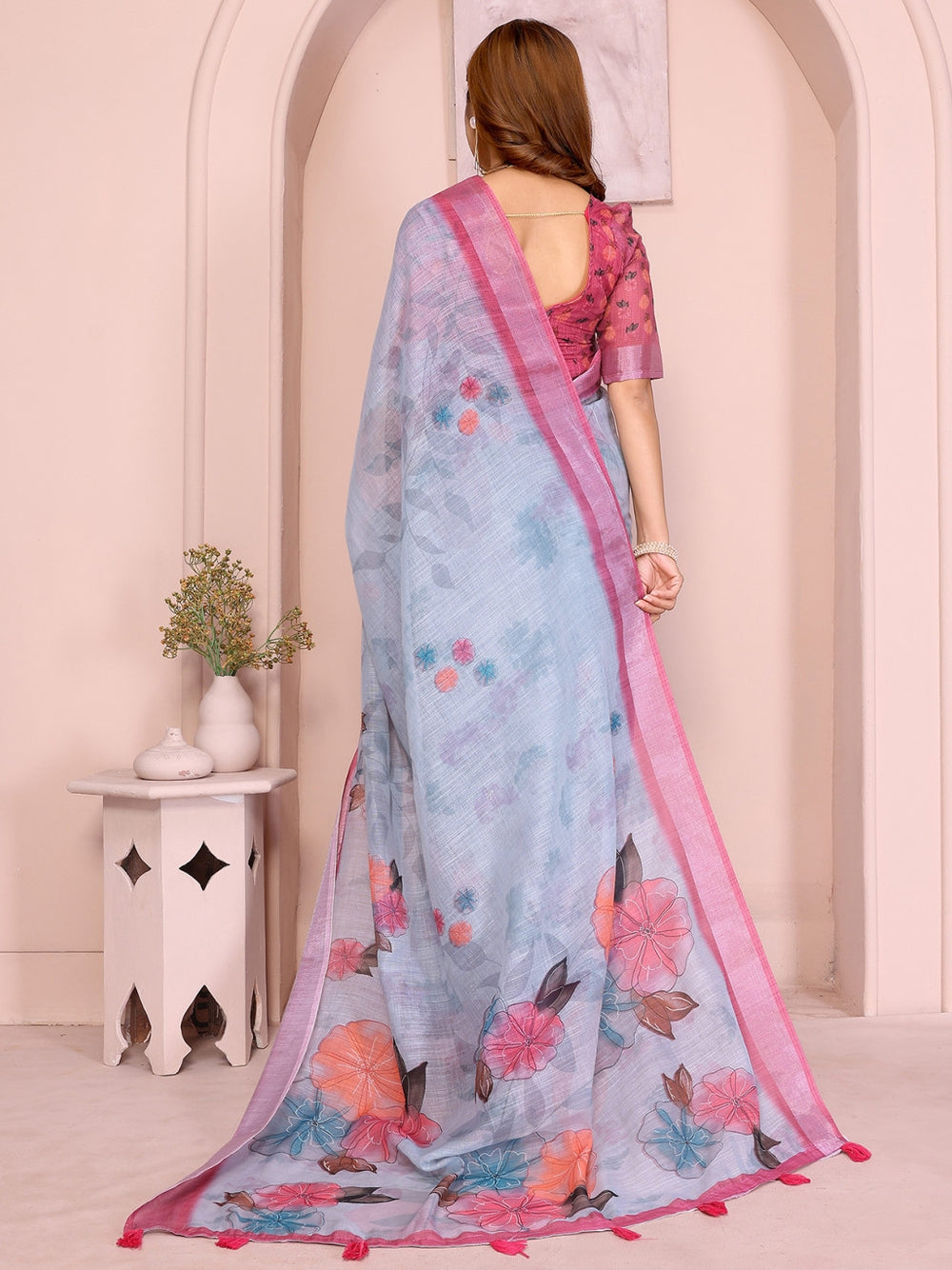 Multi linen cotton saree with digital printed work and silver zari border.