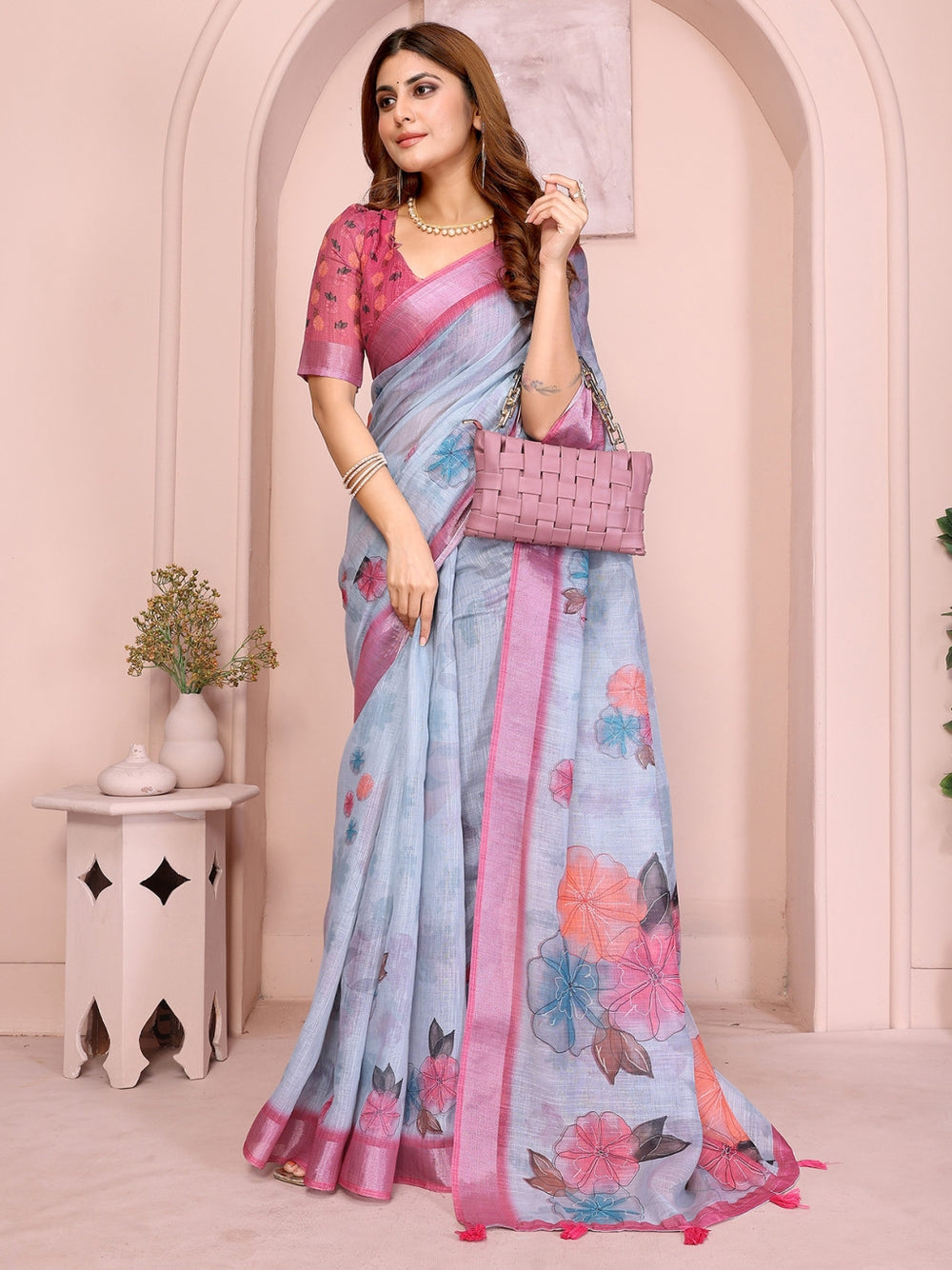 Multi linen cotton saree with digital printed work and silver zari border.