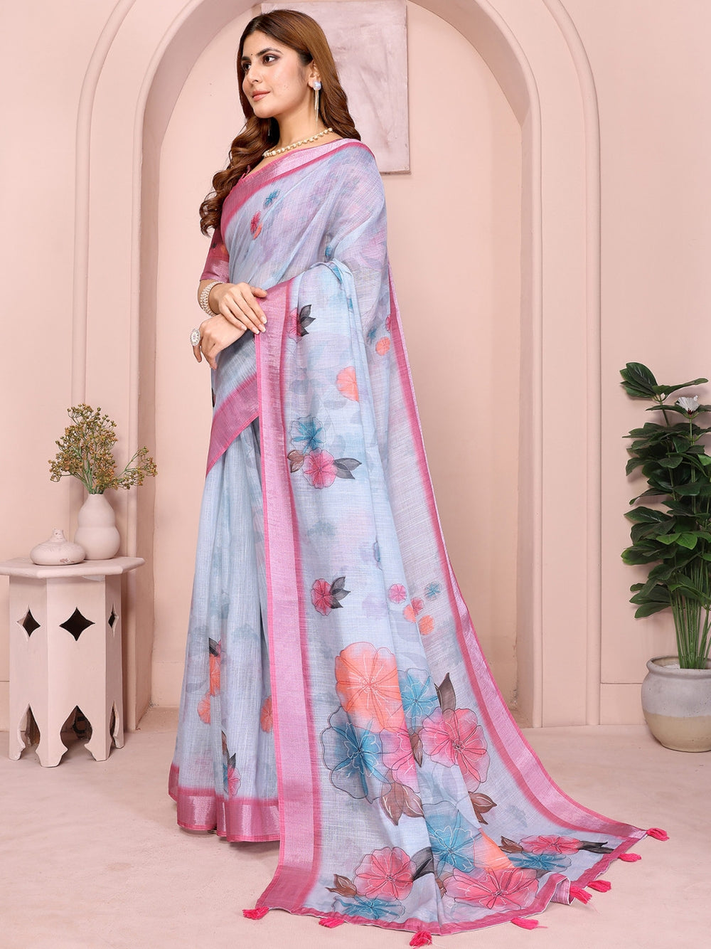 Multi linen cotton saree with digital printed work and silver zari border.