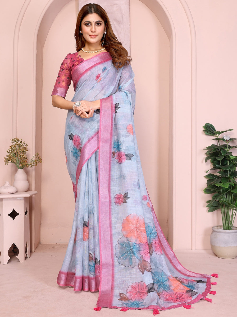 Multi linen cotton saree with digital printed work and silver zari border.