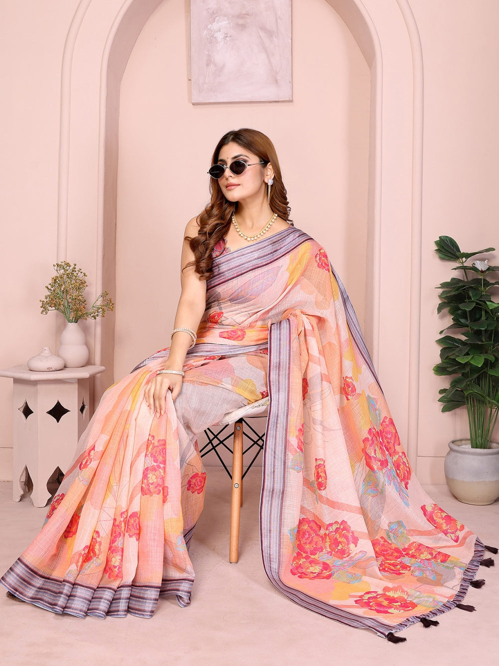 Multi linen cotton saree with digital printed work and silver zari border.