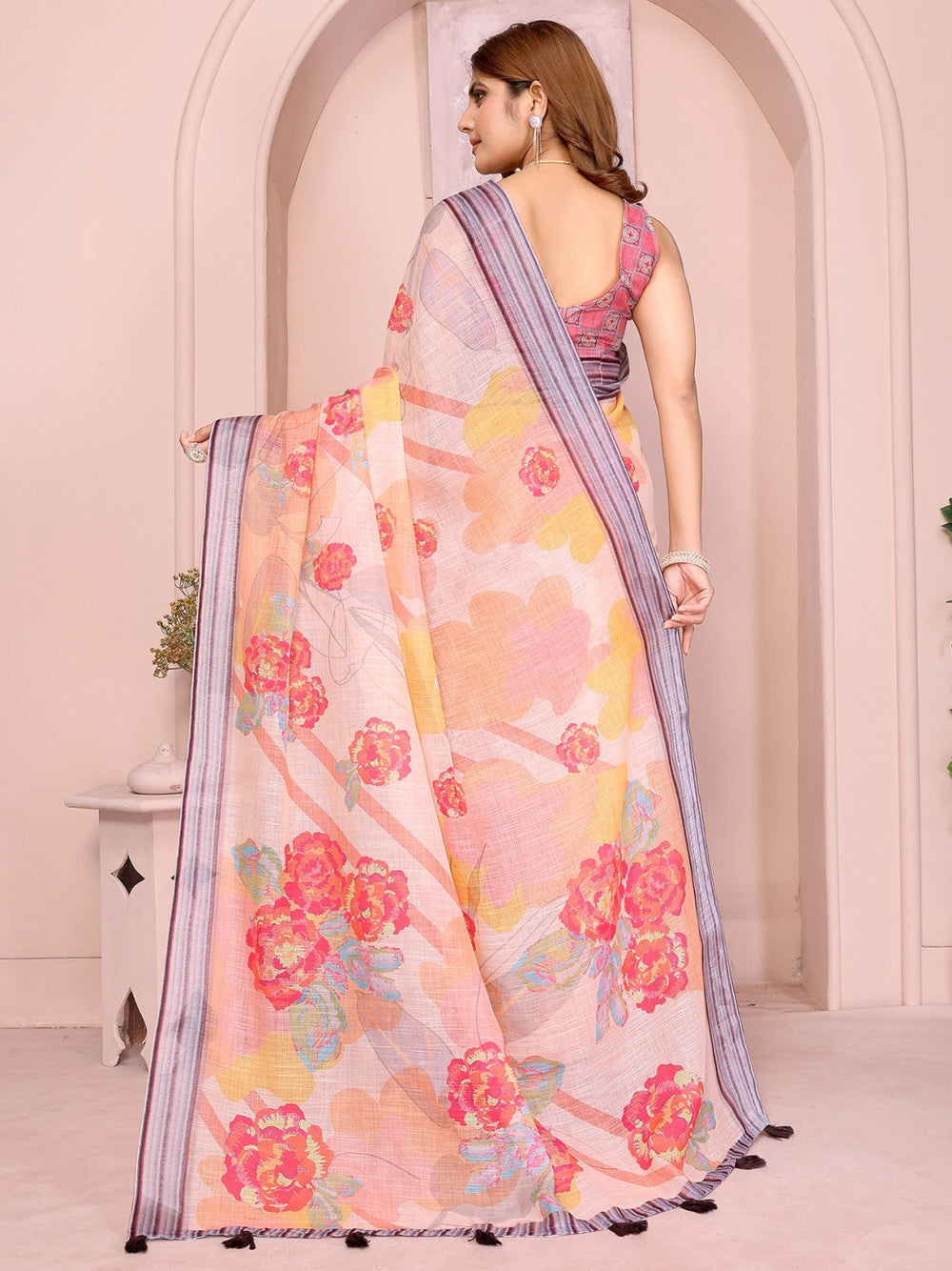 Multi linen cotton saree with digital printed work and silver zari border.