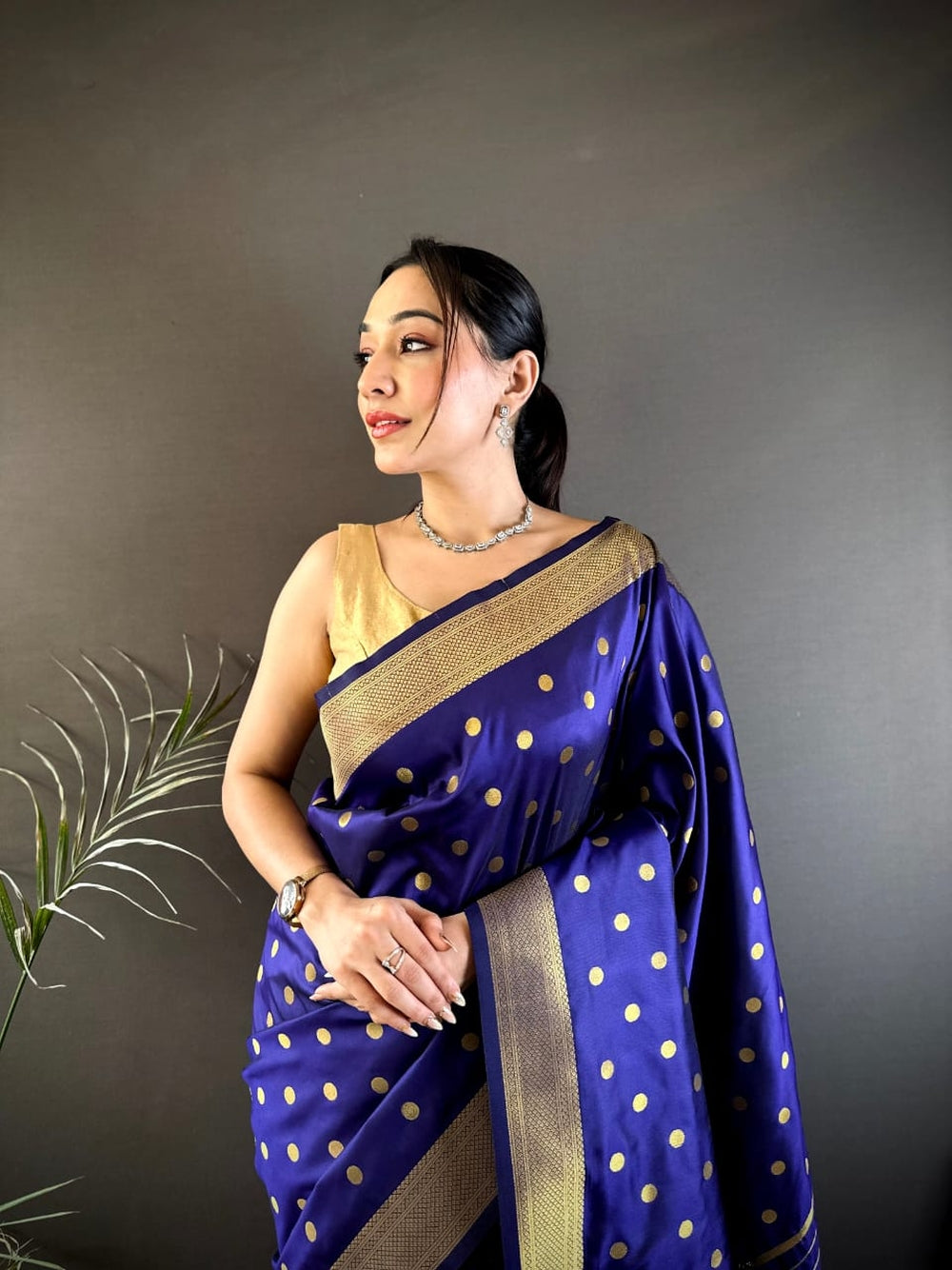 Traditional paithani silk saree with zari weaving work.