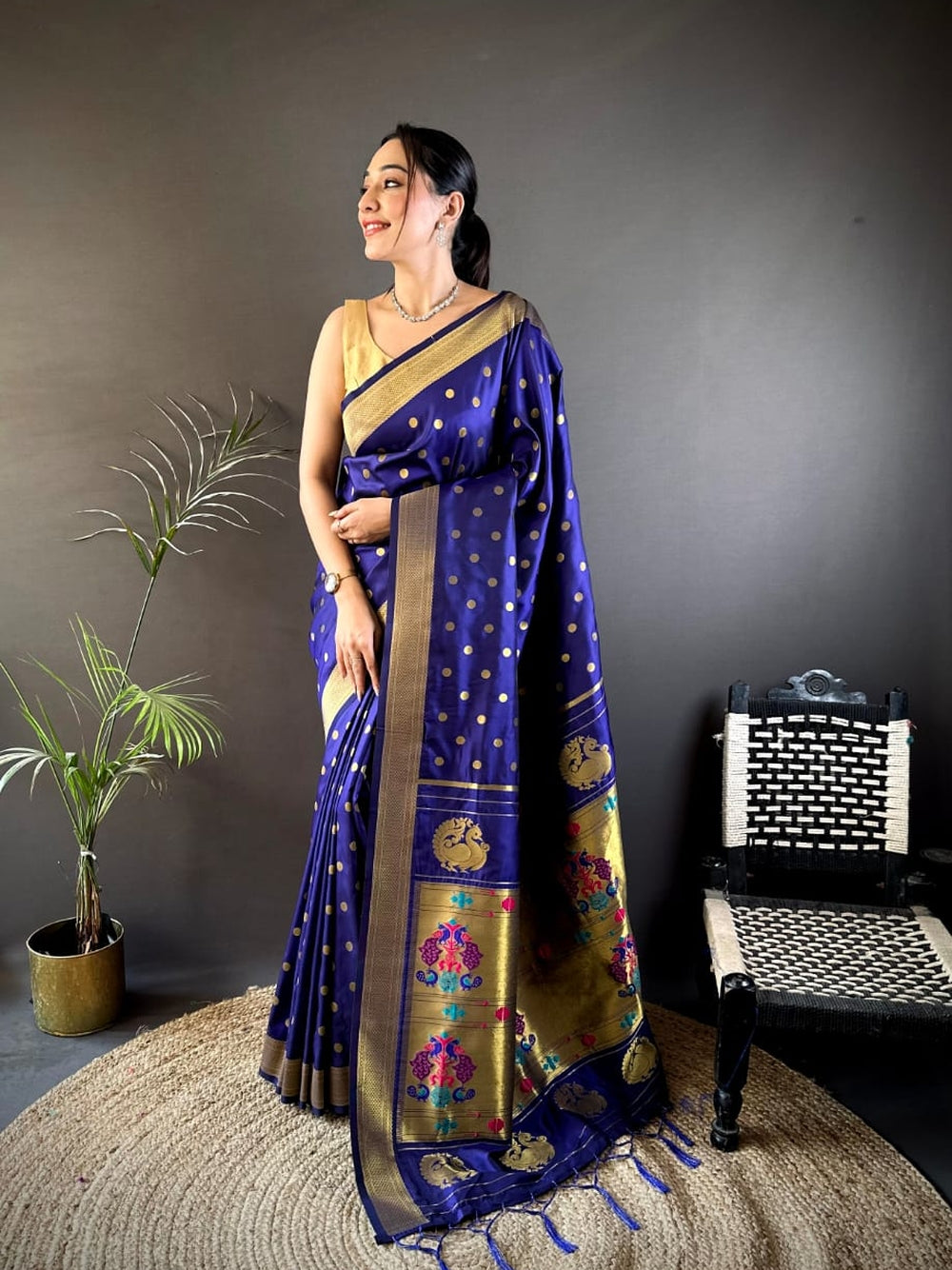 Traditional paithani silk saree with zari weaving work.