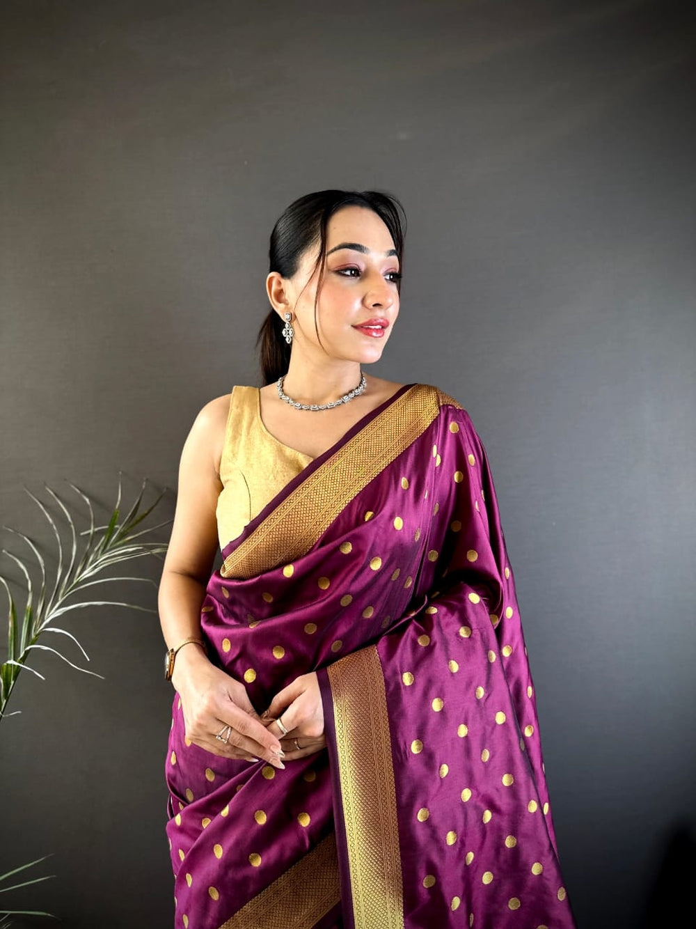 Traditional paithani silk saree with zari weaving work.