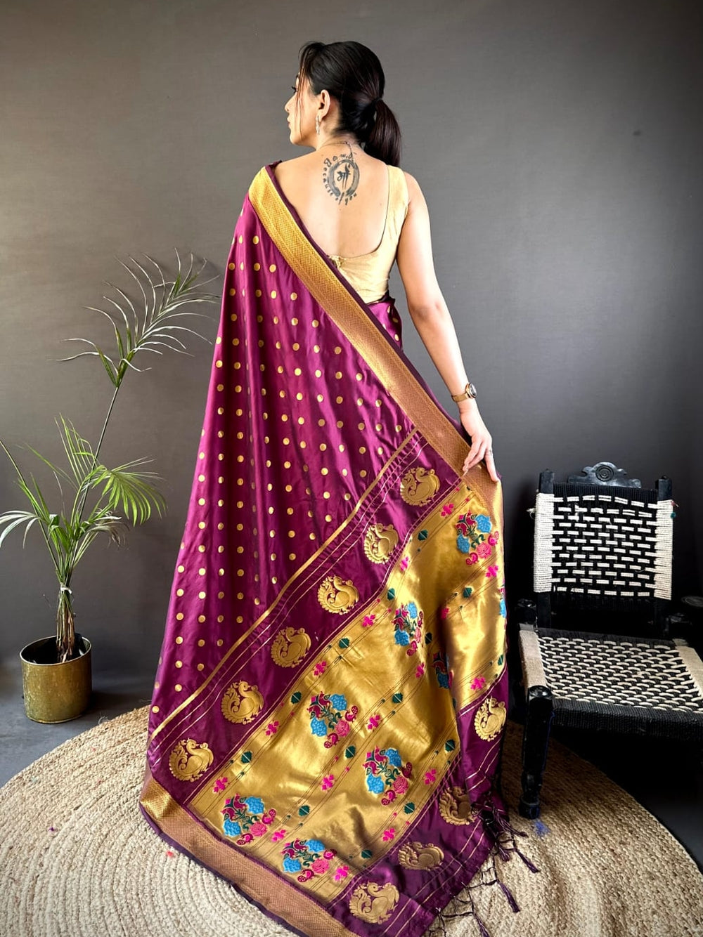 Traditional paithani silk saree with zari weaving work.