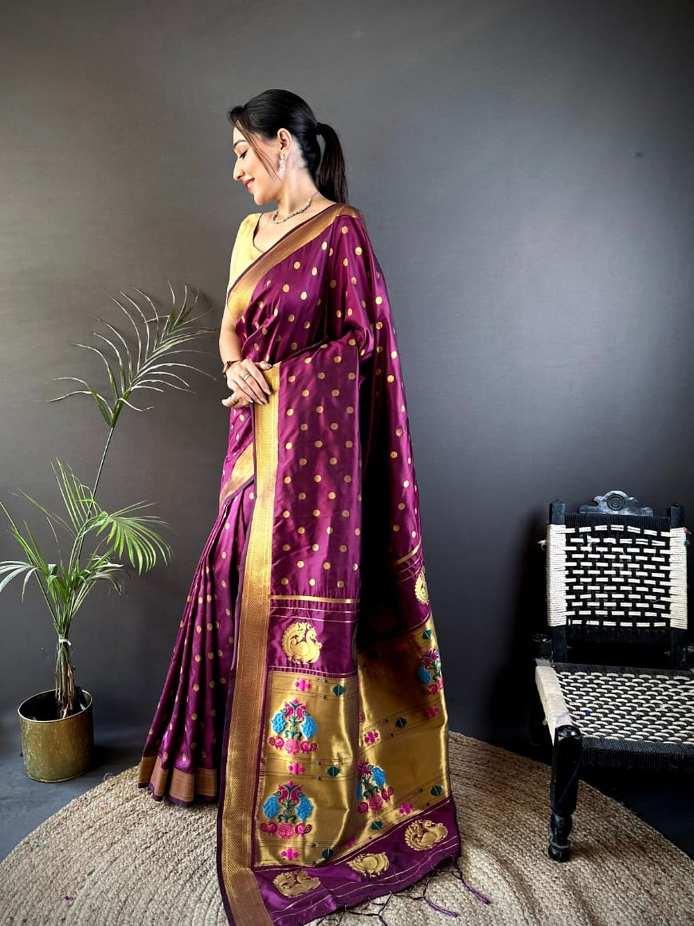 Traditional paithani silk saree with zari weaving work.