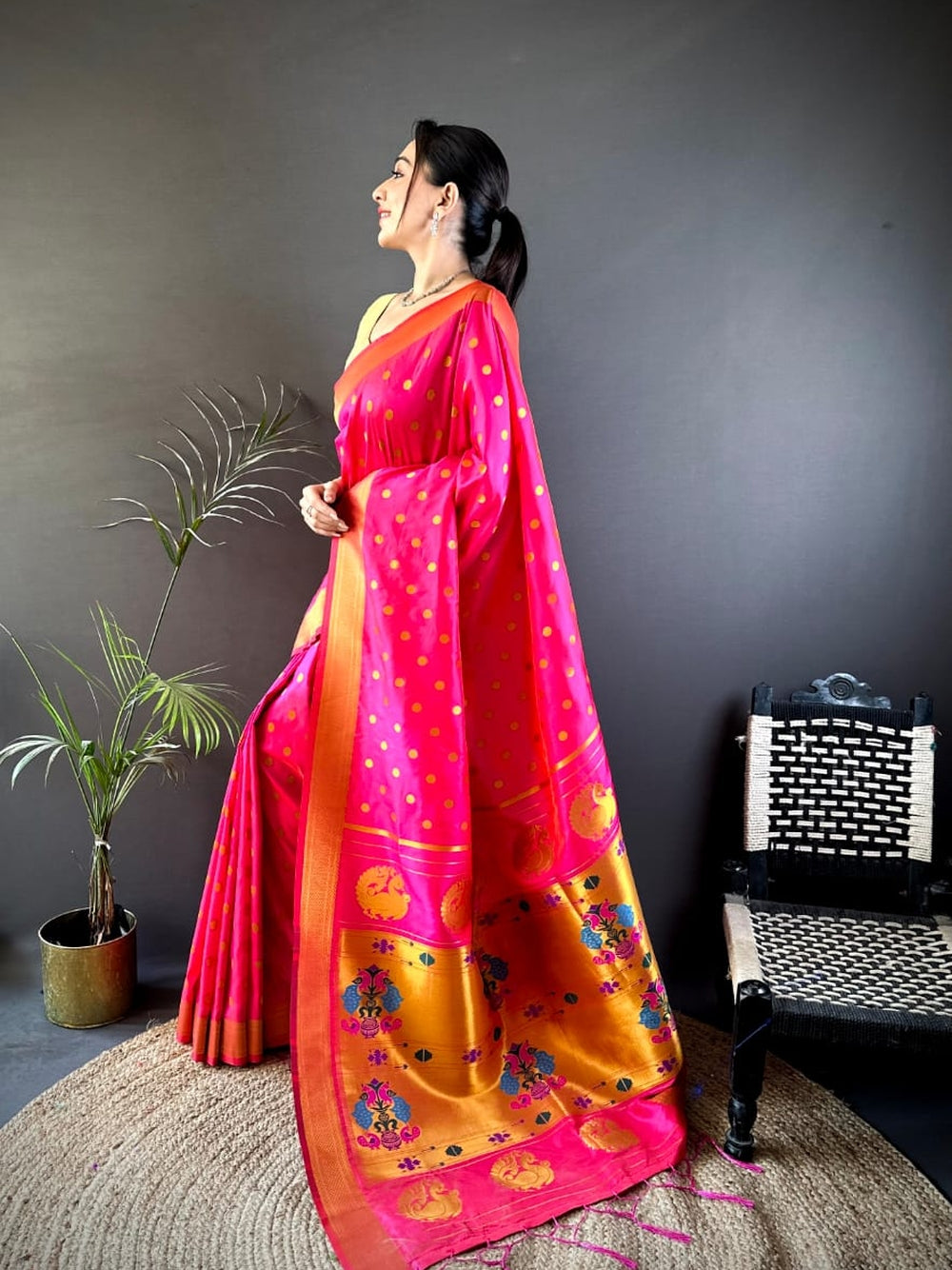 Traditional paithani silk saree with zari weaving work.