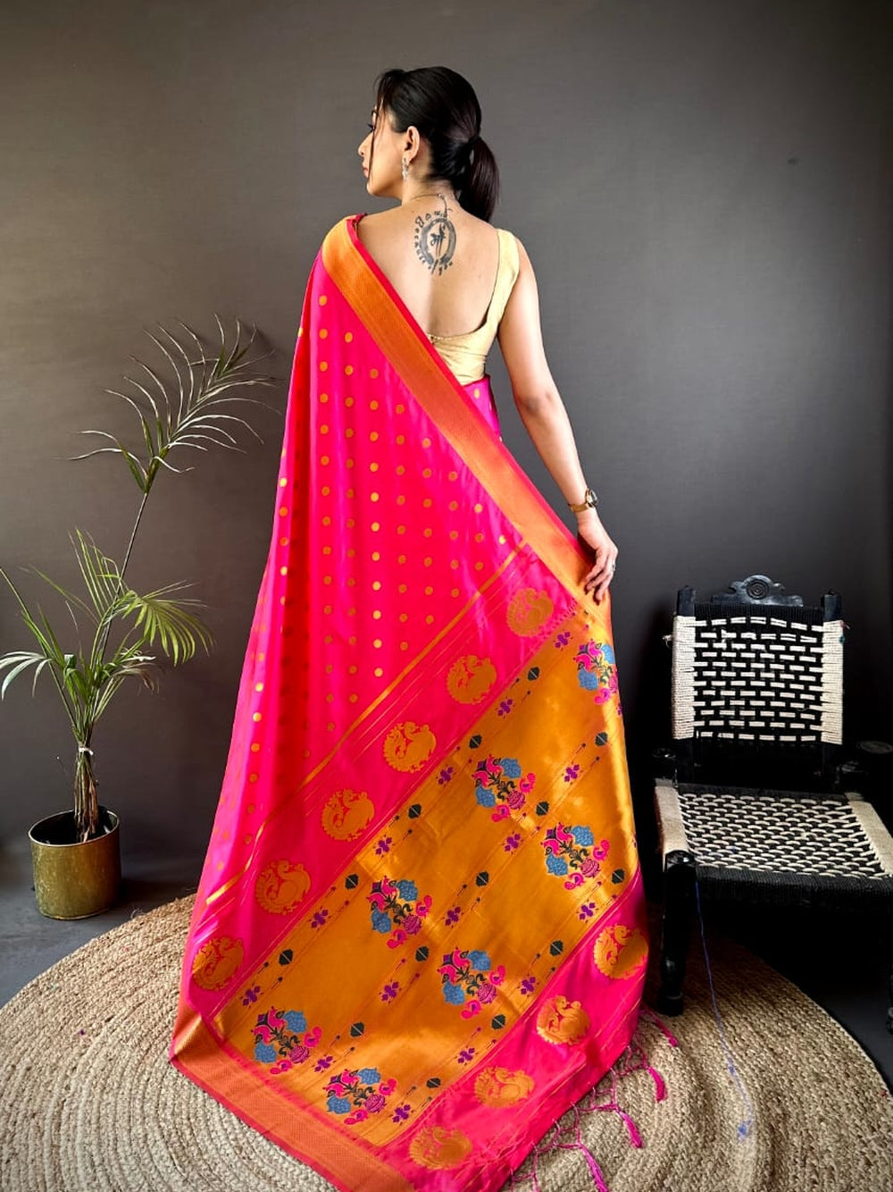 Traditional paithani silk saree with zari weaving work.