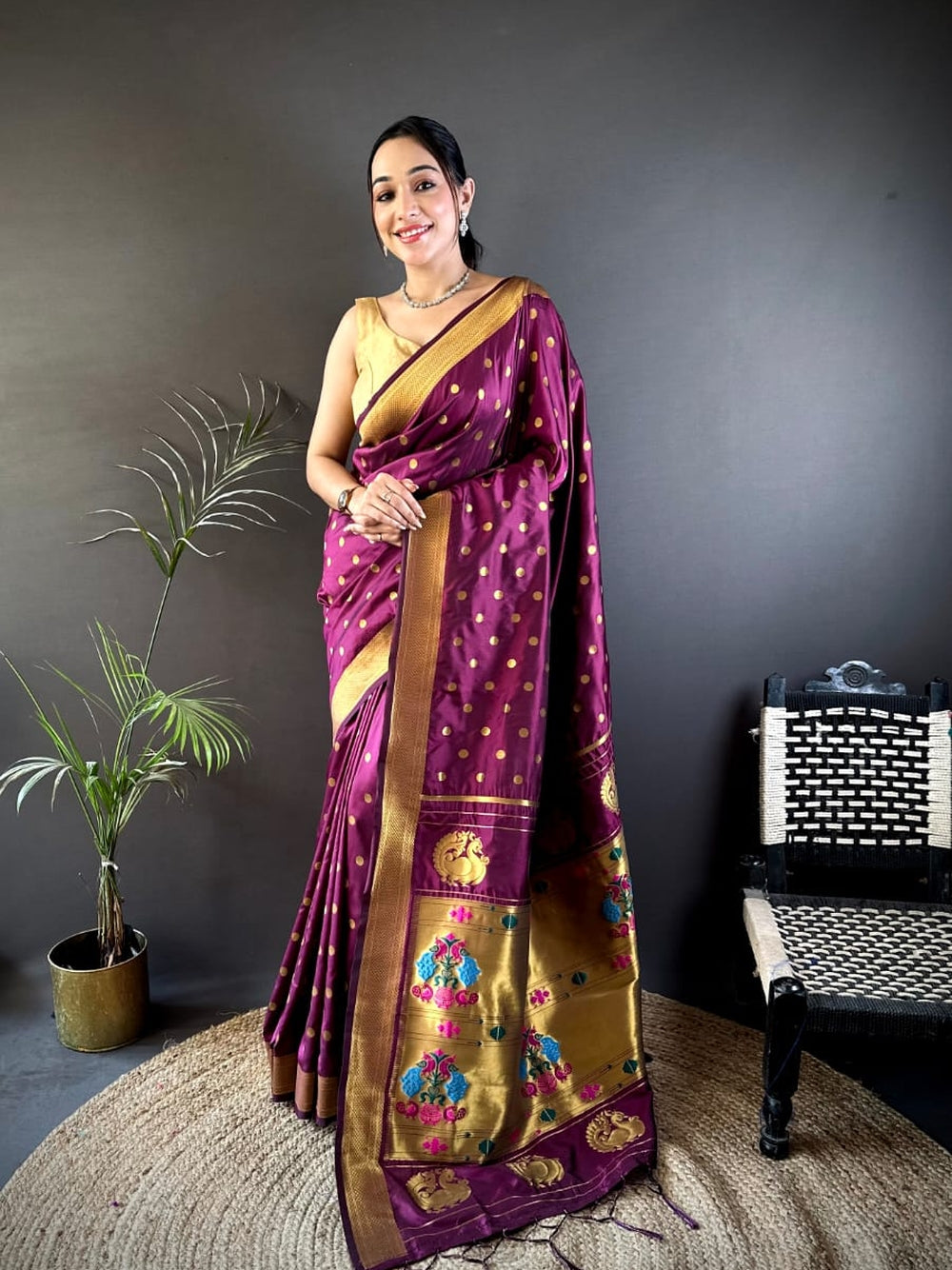 Traditional paithani silk saree with zari weaving work.