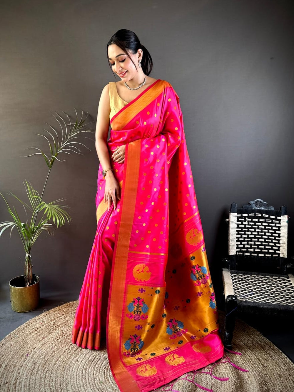 Traditional paithani silk saree with zari weaving work.