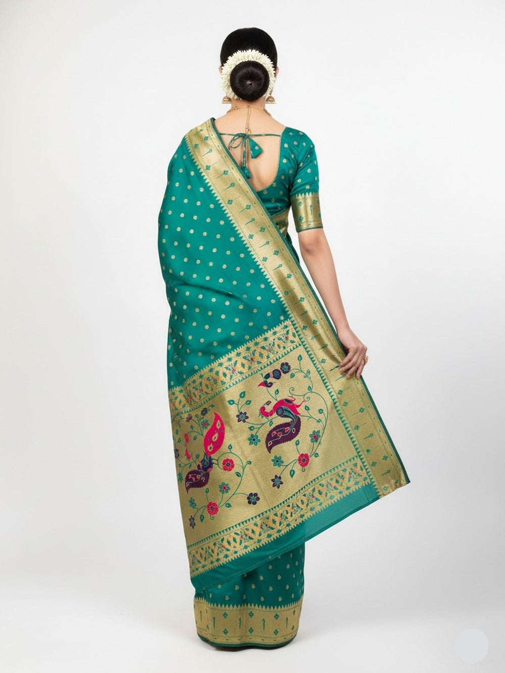 Traditional  paithani silk saree with zari weaving work.