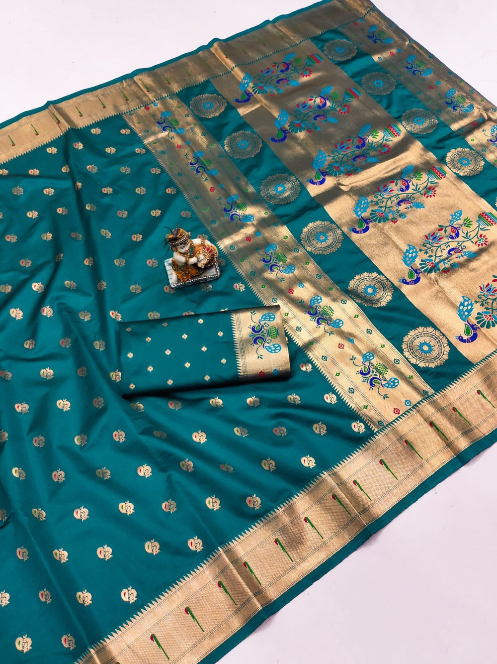 Traditional  Lichi silk paithani saree with zari weaving work.