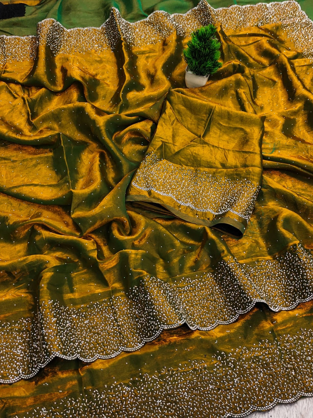 Fancy satin silk saree with siroski work.