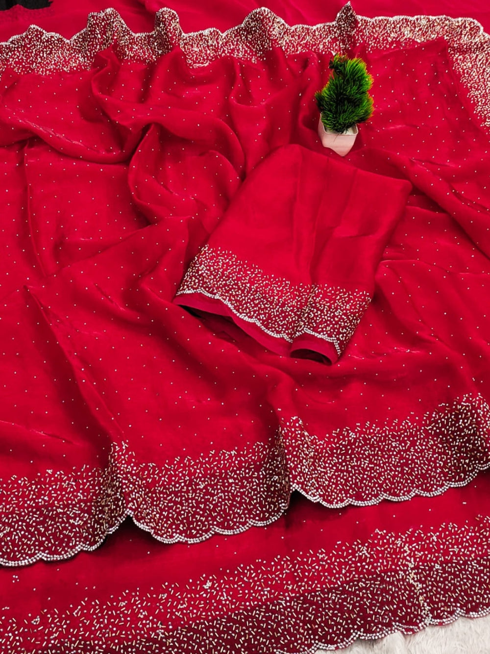 Fancy satin silk saree with siroski work.